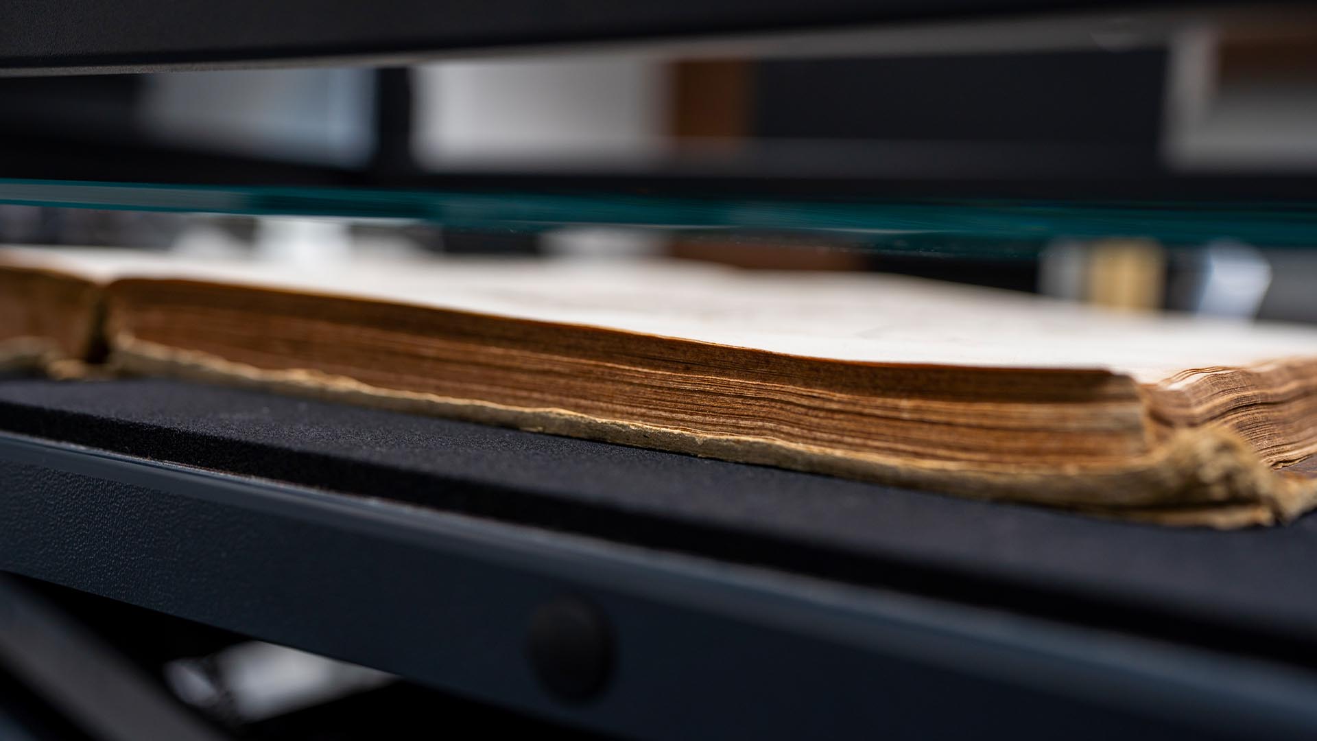 TILE_About_IA_Closeup_Book